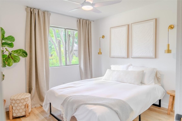 4407 Ganymede Dr, Austin, TX 78727 - bedroom featuring wood finished floors and a ceiling fan