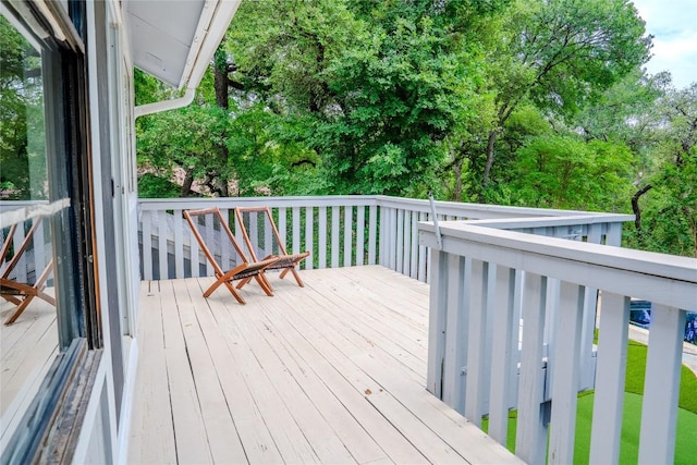4407 Ganymede Dr, Austin, TX 78727 - wooden deck featuring view of scattered trees