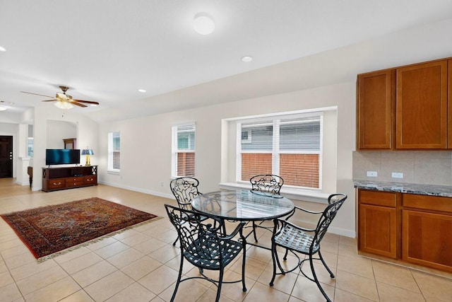 7619 Europa Ave, Round Rock, TX 78665 - dining space featuring light tile patterned floors, ceiling fan, and recessed lighting