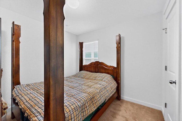 7619 Europa Ave, Round Rock, TX 78665 - bedroom featuring carpet floors and baseboards