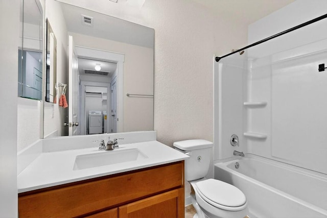 7619 Europa Ave, Round Rock, TX 78665 - bathroom featuring vanity,  shower combination, washer and dryer, and a textured wall