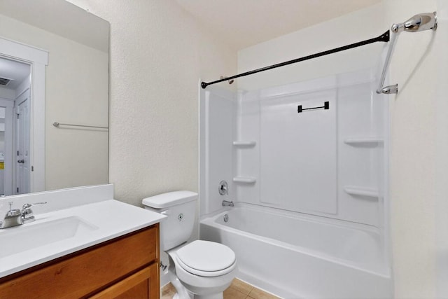 7619 Europa Ave, Round Rock, TX 78665 - full bath with vanity, tub / shower combination, tile patterned flooring, and a textured wall
