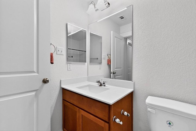 7619 Europa Ave, Round Rock, TX 78665 - bathroom featuring vanity and a textured wall