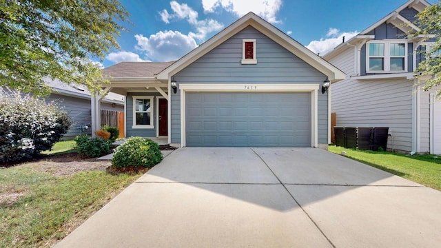 7619 Europa Ave, Round Rock, TX 78665 - view of front of house with concrete driveway and an attached garage