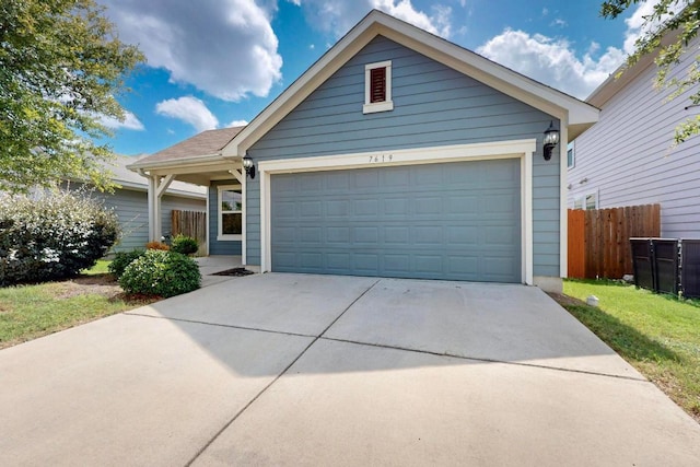 7619 Europa Ave, Round Rock, TX 78665 - ranch-style house with concrete driveway and a garage