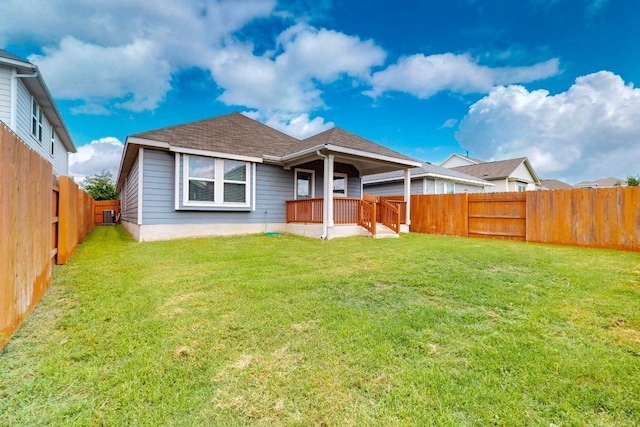 7619 Europa Ave, Round Rock, TX 78665 - rear view of property with a fenced backyard, a porch, and roof with shingles