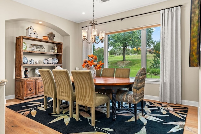 9 Borello Dr Unit 9, Austin, TX 78738 - dining area featuring a chandelier, wood finished floors, and recessed lighting