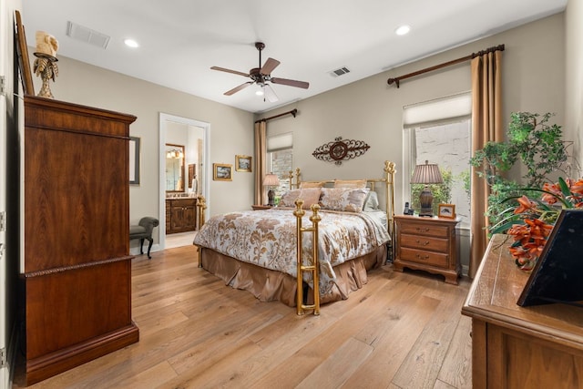 9 Borello Dr Unit 9, Austin, TX 78738 - bedroom featuring light wood-style floors, recessed lighting, ensuite bathroom, and ceiling fan
