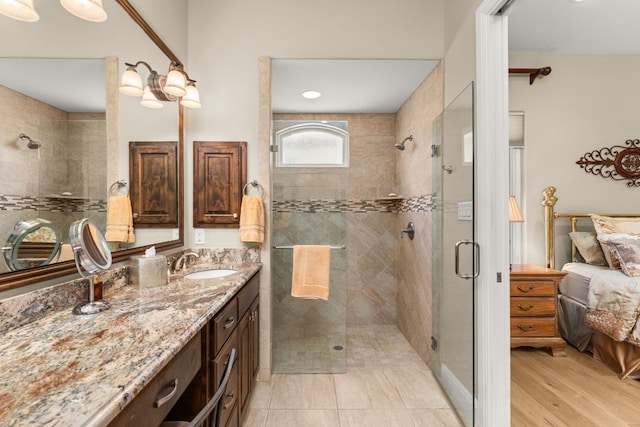 9 Borello Dr Unit 9, Austin, TX 78738 - full bath with a shower stall, connected bathroom, and vanity