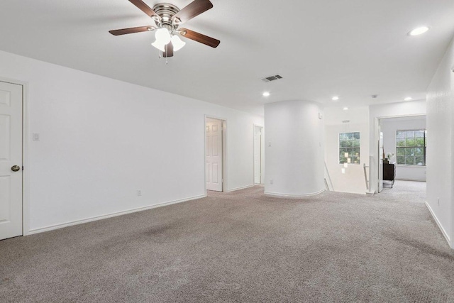 12706 Shemya Cv, Austin, TX 78729 - spare room with light colored carpet, recessed lighting, and a ceiling fan
