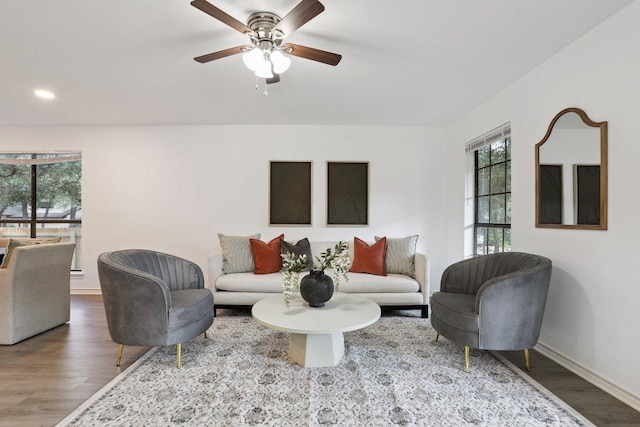 12706 Shemya Cv, Austin, TX 78729 - living area featuring healthy amount of natural light, wood finished floors, a ceiling fan, and recessed lighting