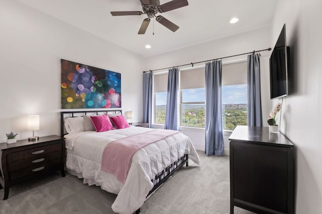 1300 Sparrow Ln, Austin, TX 78734 - bedroom with light colored carpet, a ceiling fan, and recessed lighting
