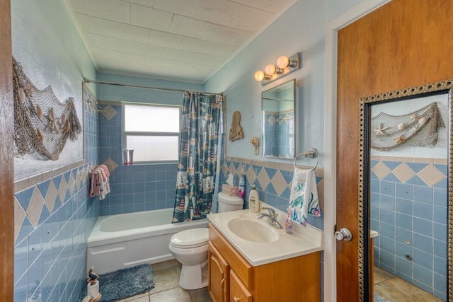 106 Chuckwagon, Burnet, TX 78611 - bathroom with tile walls, tile patterned floors, vanity, shower / tub combo, and crown molding