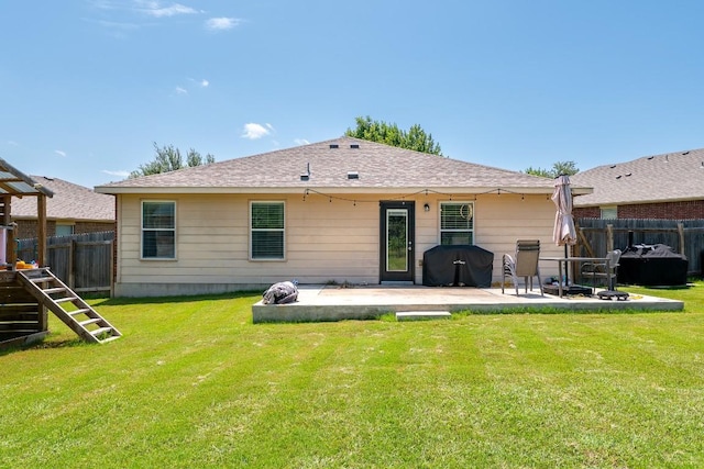 5601 Malcom Trl, Austin, TX 78754 - rear view of house featuring a patio and a fenced backyard