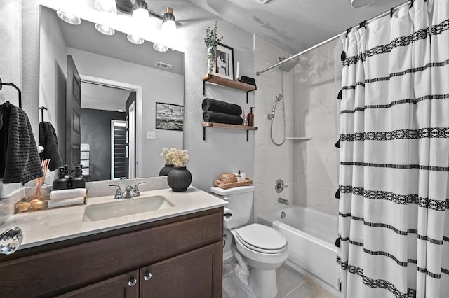 244 Fabion St, Kyle, TX 78640 - bathroom featuring vanity, shower / bathtub combination with curtain, tile patterned flooring, and a textured wall