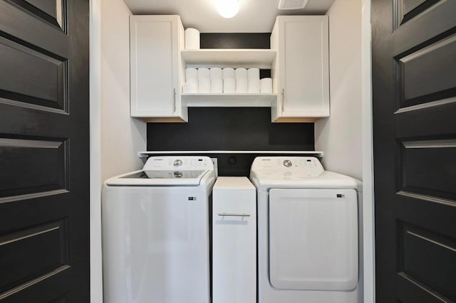 244 Fabion St, Kyle, TX 78640 - washroom featuring washing machine and dryer and cabinet space