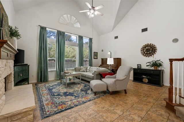 2500 Melekhin Bnd, Cedar Park, TX 78613 - living room featuring high vaulted ceiling, a ceiling fan, and a stone fireplace