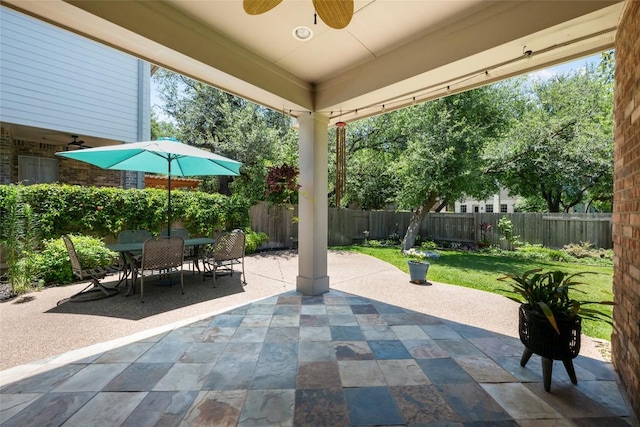 2500 Melekhin Bnd, Cedar Park, TX 78613 - fenced backyard featuring a ceiling fan, a patio, and outdoor dining area