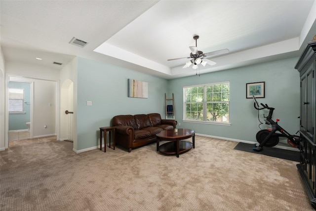 2500 Melekhin Bnd, Cedar Park, TX 78613 - living room featuring ceiling fan, light colored carpet, and a tray ceiling
