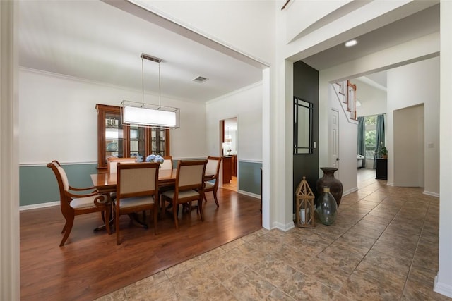 2500 Melekhin Bnd, Cedar Park, TX 78613 - dining area with crown molding and baseboards