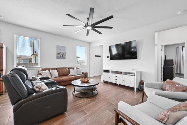 170 Banff Dr, Kyle, TX 78640 - living area featuring a ceiling fan and dark wood-style floors