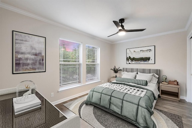 1113 Lott Ave, Austin, TX 78721 - bedroom featuring crown molding, wood finished floors, and a ceiling fan