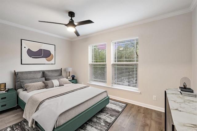 1113 Lott Ave, Austin, TX 78721 - bedroom with crown molding, light wood-style floors, and a ceiling fan