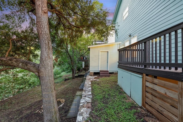 1113 Lott Ave, Austin, TX 78721 - yard at dusk featuring a shed and a deck