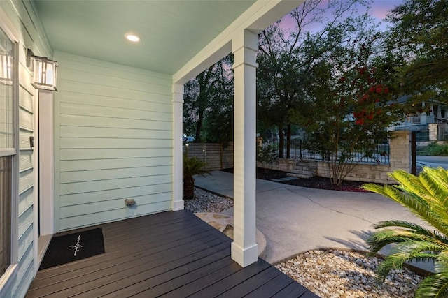 1113 Lott Ave, Austin, TX 78721 - deck at dusk featuring a patio area