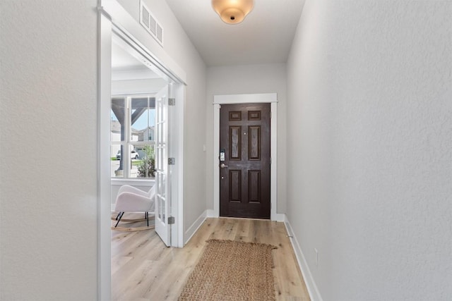 3101 Maysilee St, Austin, TX 78728 - entryway with light wood-style floors and baseboards