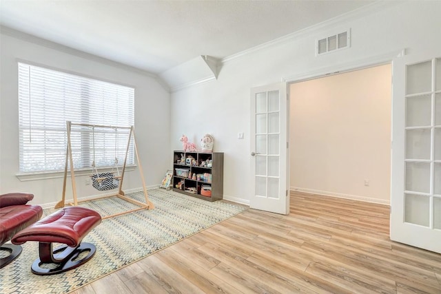 112 Silver Ridge Dr, Georgetown, TX 78633 - living area with crown molding, wood finished floors, and french doors