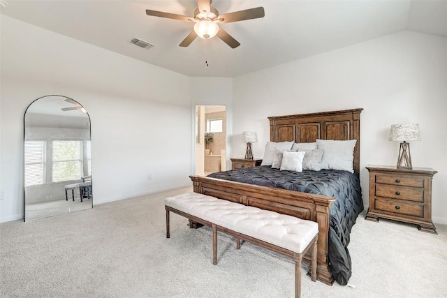 112 Silver Ridge Dr, Georgetown, TX 78633 - bedroom with light colored carpet, connected bathroom, ceiling fan, and vaulted ceiling