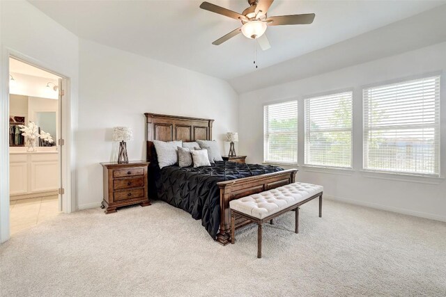 112 Silver Ridge Dr, Georgetown, TX 78633 - bedroom with light colored carpet, vaulted ceiling, ensuite bathroom, and a ceiling fan
