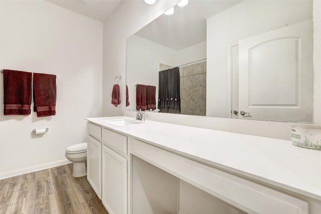 112 Silver Ridge Dr, Georgetown, TX 78633 - bathroom with vanity, wood finished floors, and a tile shower