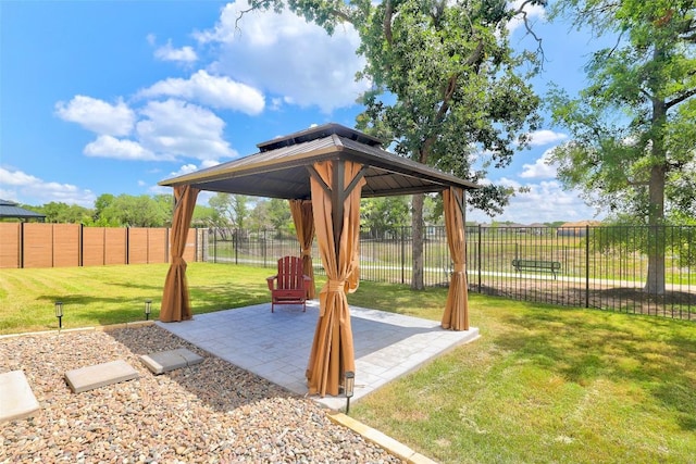 112 Silver Ridge Dr, Georgetown, TX 78633 - fenced backyard with a gazebo and a patio