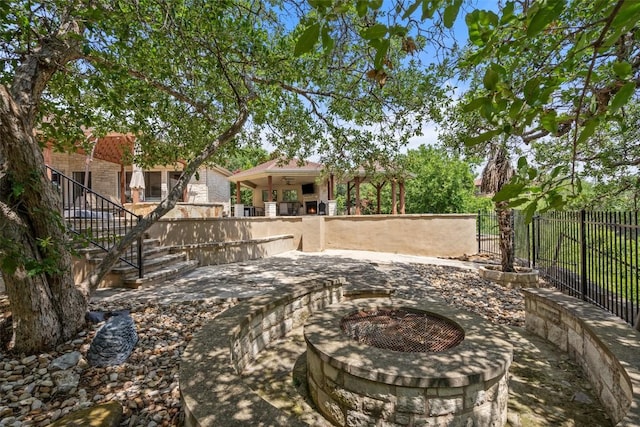22126 Briarcliff Dr, Spicewood, TX 78669 - view of patio / terrace featuring an outdoor fire pit and a ceiling fan