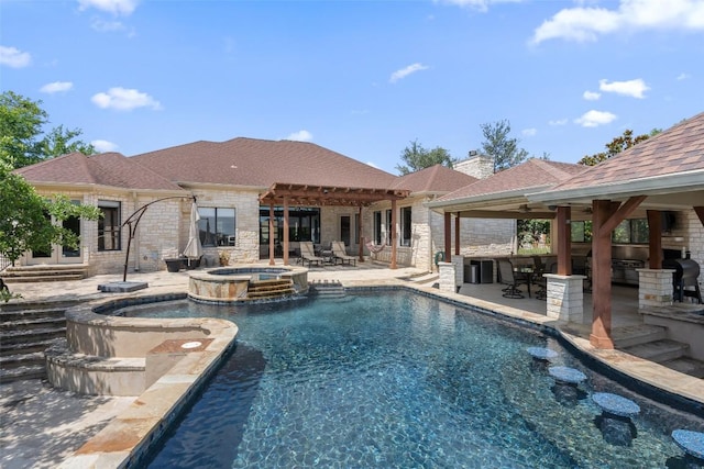 22126 Briarcliff Dr, Spicewood, TX 78669 - view of swimming pool featuring area for grilling, a bar, a patio area, and a pool with connected hot tub