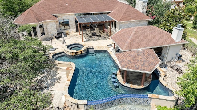 22126 Briarcliff Dr, Spicewood, TX 78669 - view of swimming pool featuring outdoor dining area, a patio area, a fenced backyard, and a pool with connected hot tub