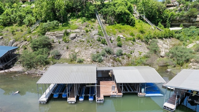 22126 Briarcliff Dr, Spicewood, TX 78669 - dock area with boat lift and a water view