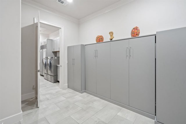 22126 Briarcliff Dr, Spicewood, TX 78669 - corridor featuring washer and clothes dryer and ornamental molding