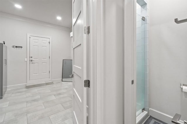 22126 Briarcliff Dr, Spicewood, TX 78669 - corridor with crown molding and recessed lighting
