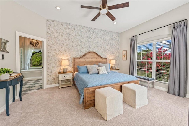 1660 W Mccarty Ln, San Marcos, TX 78666 - bedroom with wallpapered walls, an accent wall, multiple windows, carpet floors, and recessed lighting