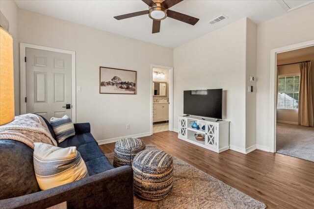 1660 W Mccarty Ln, San Marcos, TX 78666 - living room featuring a ceiling fan and wood finished floors