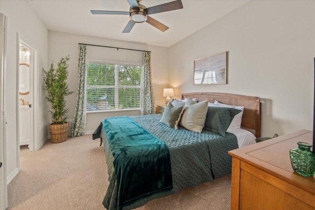 1660 W Mccarty Ln, San Marcos, TX 78666 - bedroom with light carpet and ceiling fan