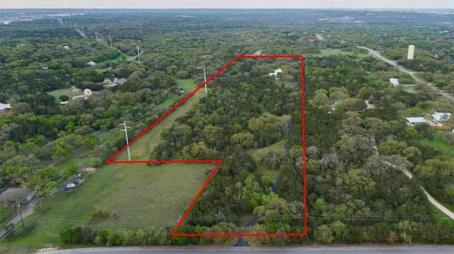 1660 W Mccarty Ln, San Marcos, TX 78666 - aerial overview of property's location featuring property boundaries highlighted and a heavily wooded area