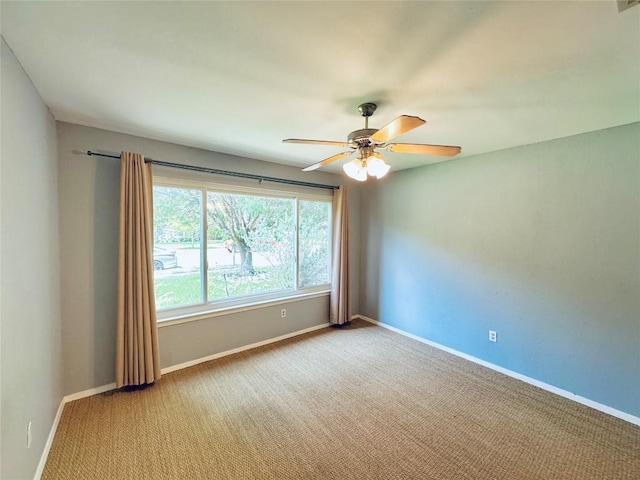 4202 Kilgore Ln, Austin, TX 78727 - spare room with a ceiling fan and light colored carpet