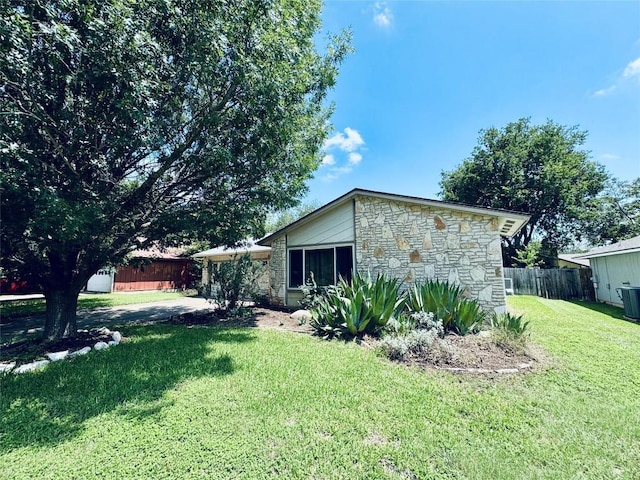 4202 Kilgore Ln, Austin, TX 78727 - view of side of property featuring stone siding