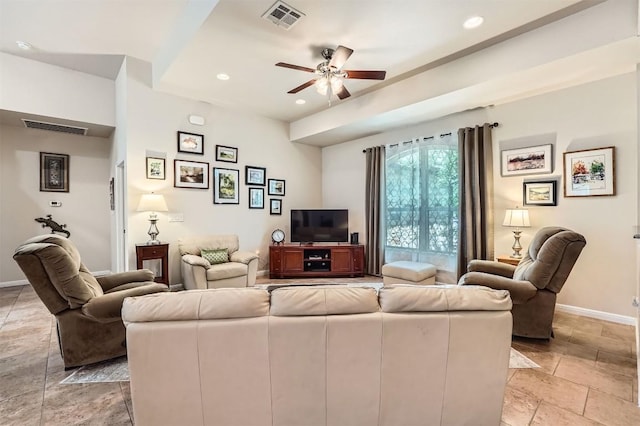 5501 Hitching Post, Lago Vista, TX 78645 - living area featuring a ceiling fan, stone tile floors, and recessed lighting