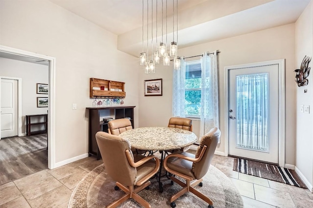 5501 Hitching Post, Lago Vista, TX 78645 - dining space featuring baseboards and a chandelier