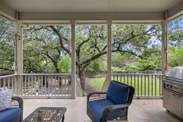 300 Errol Dr, Spicewood, TX 78669 - fenced backyard with a patio, view of wooded area, and a grill